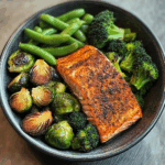 Spiced Salmon Bowl with Roasted Brussels, Sautéed Greens & Steamed Broccoli